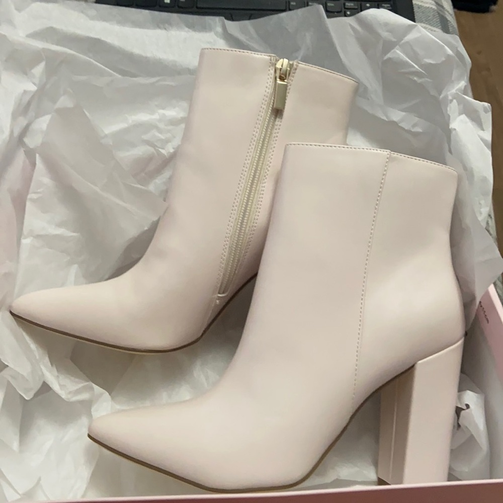 These are brand new boots from just fab never worn